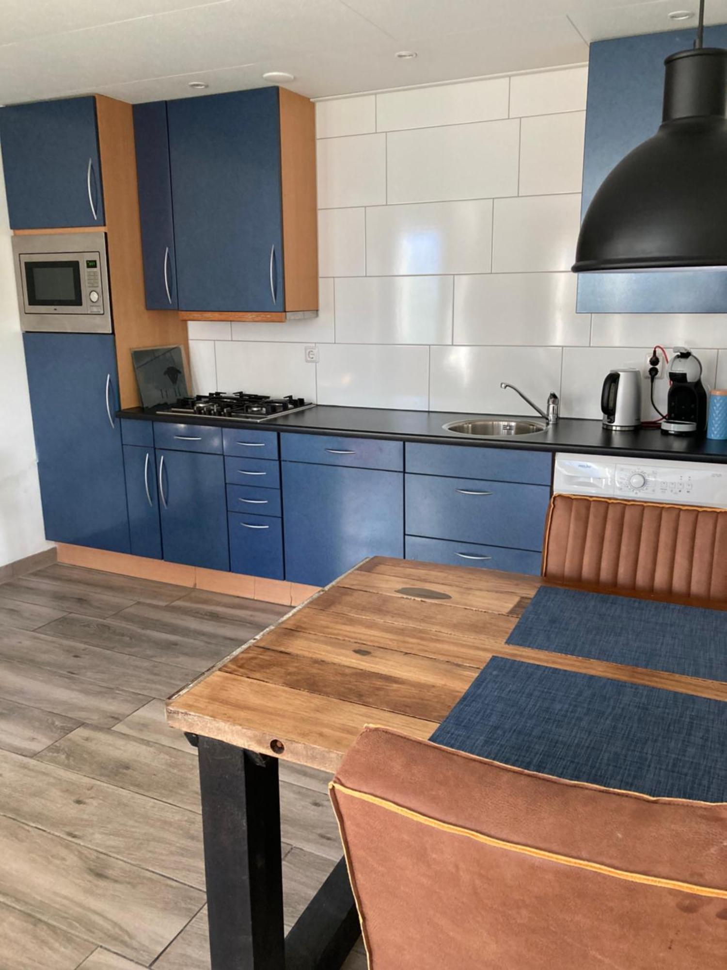 Bungalow Op Bedrijf Met Melkkoeien De Cocksdorp  Bagian luar foto